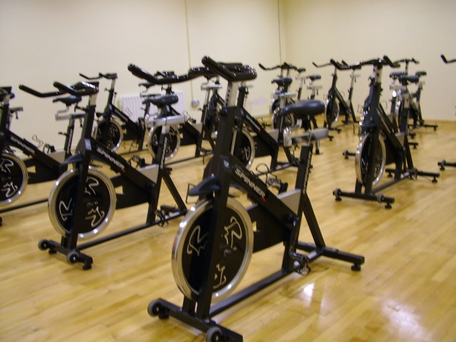 Indoor cycling spinning bikes in gym